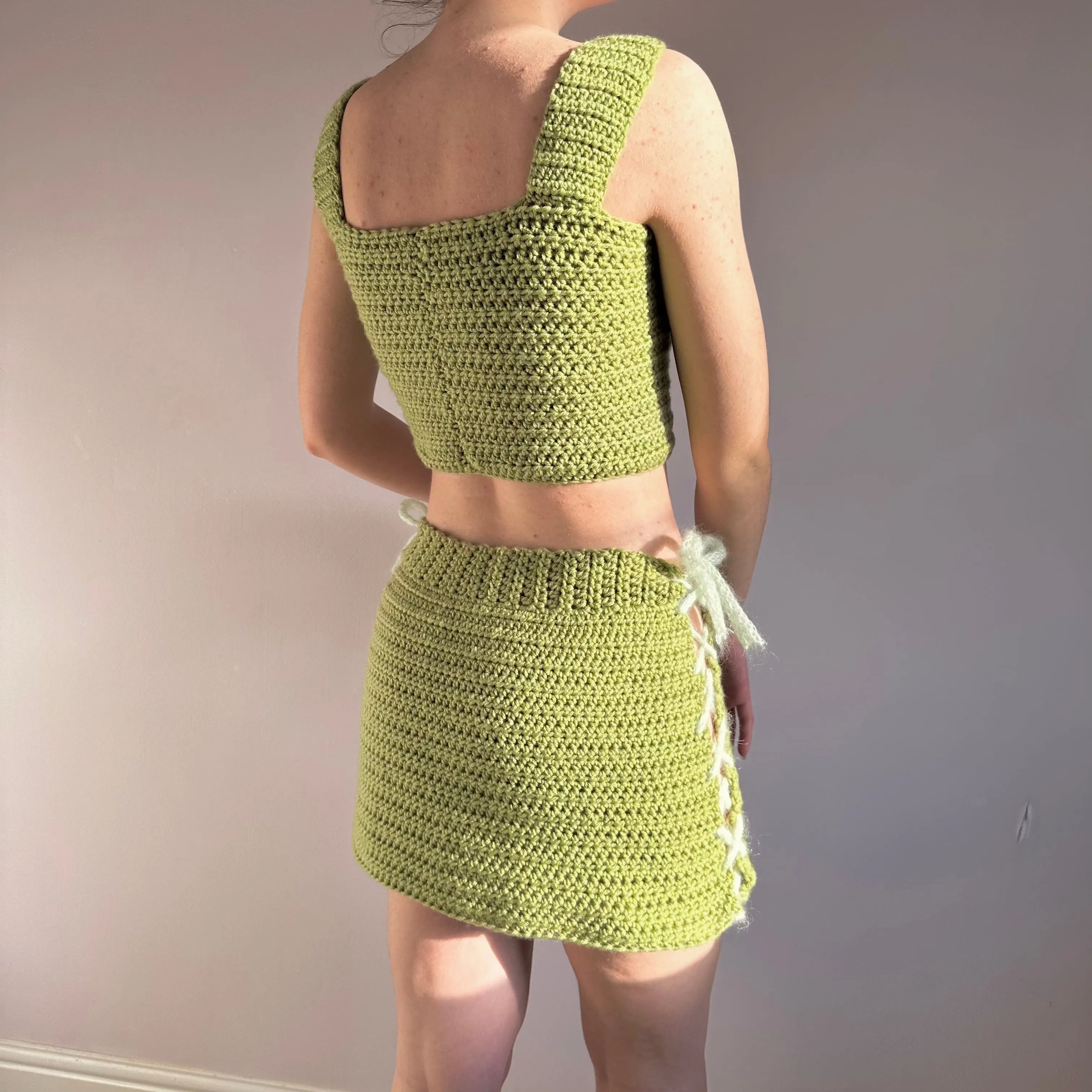 Handmade crochet coord with bow top and lace up skirt