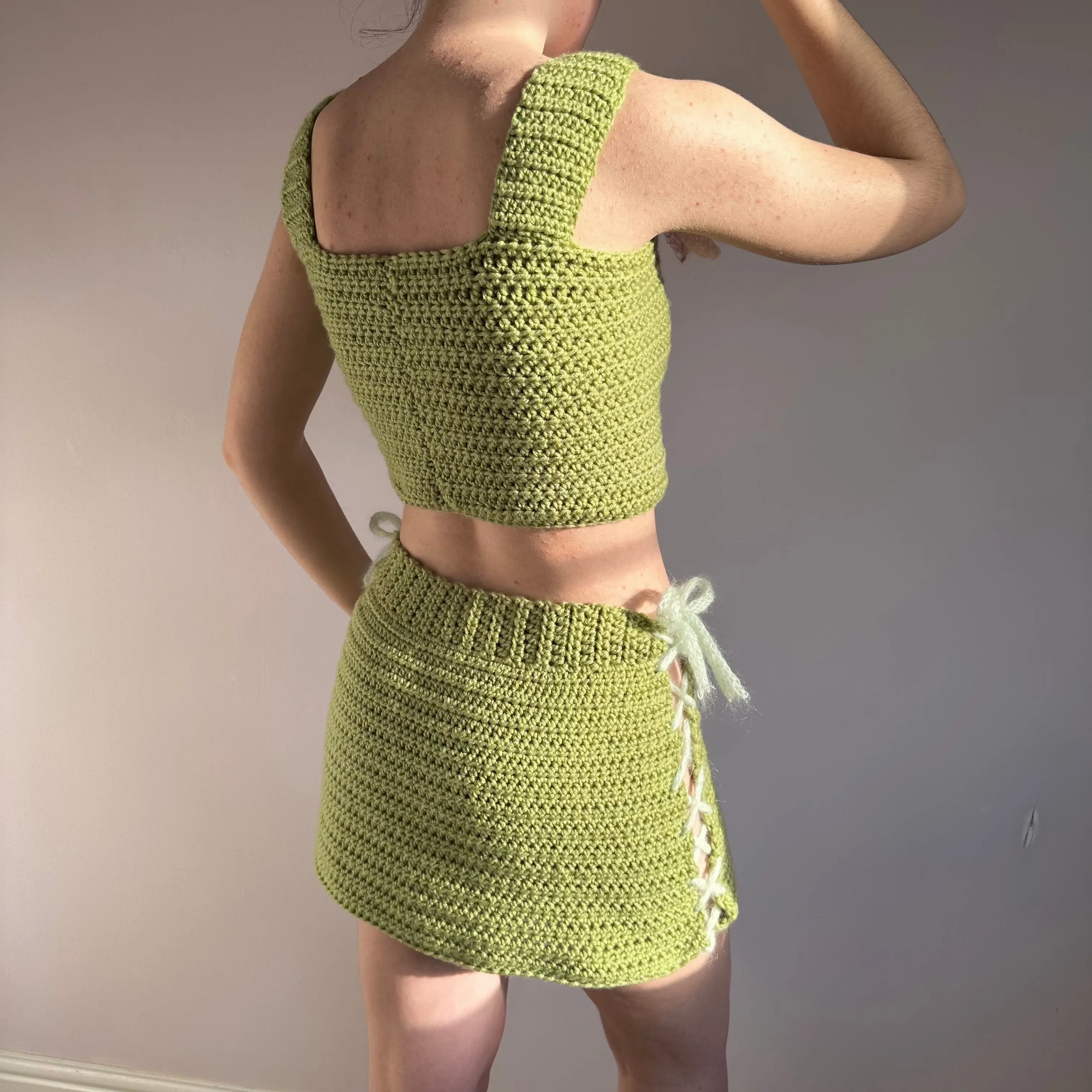Handmade crochet coord with bow top and lace up skirt