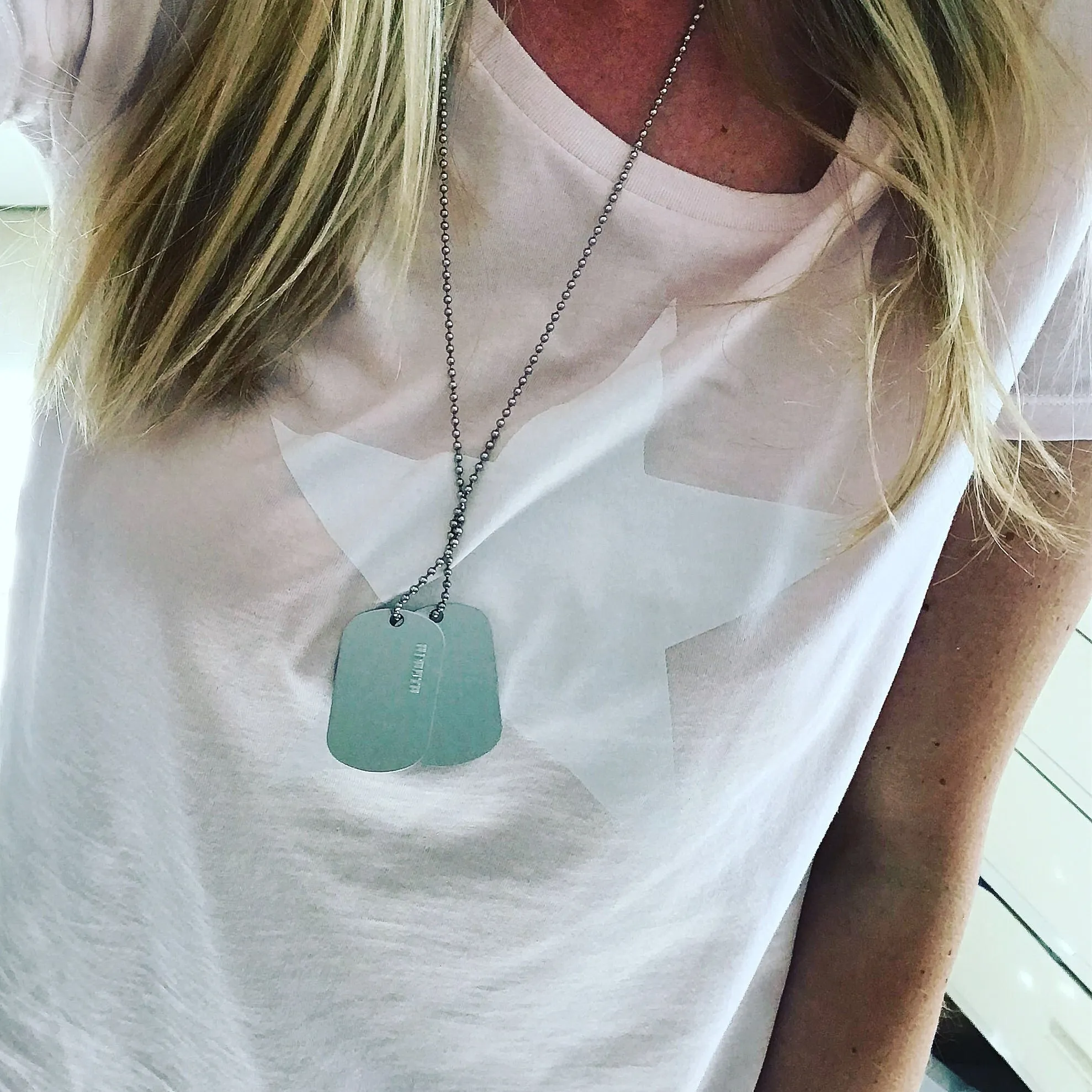 White star on pink tee