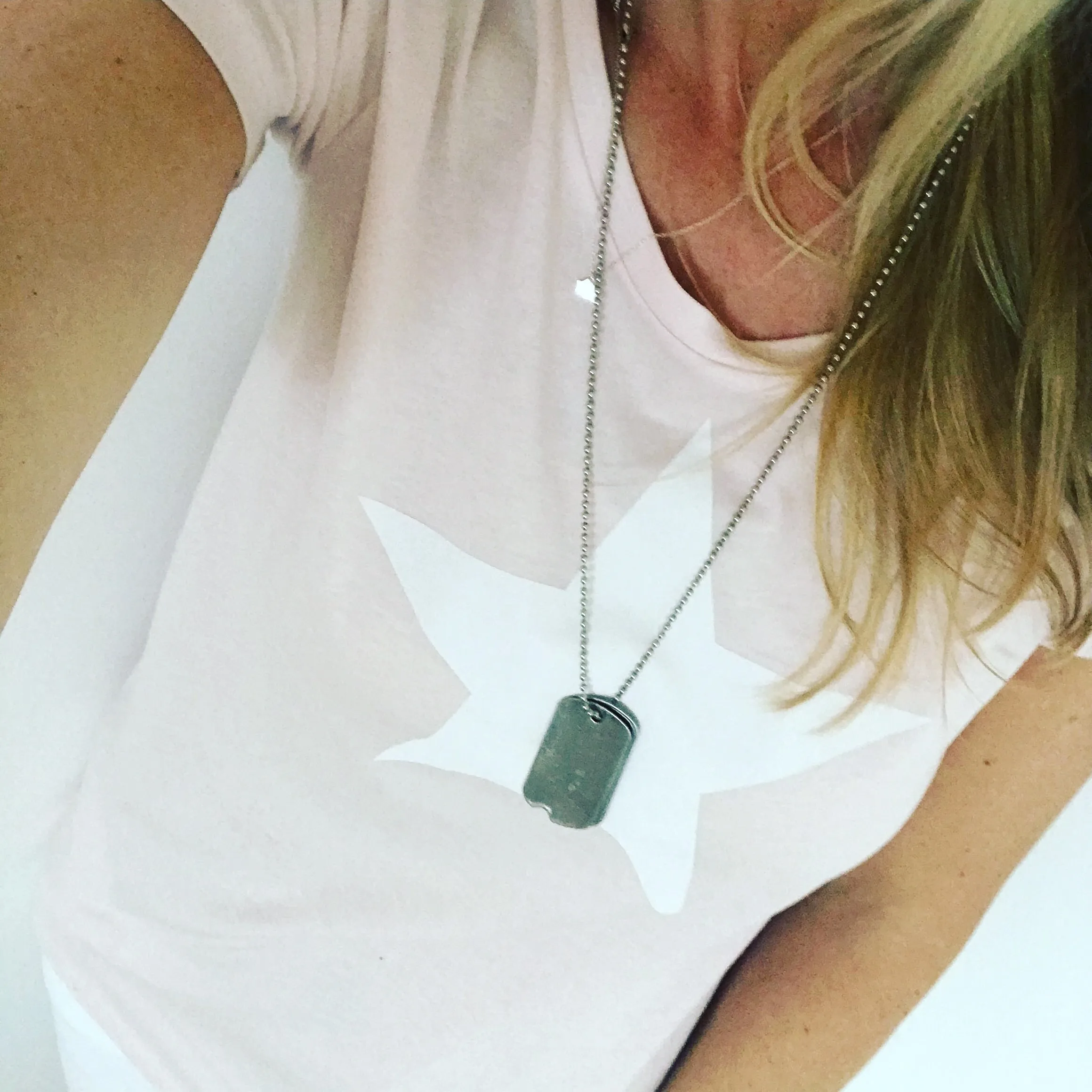 White star on pink tee